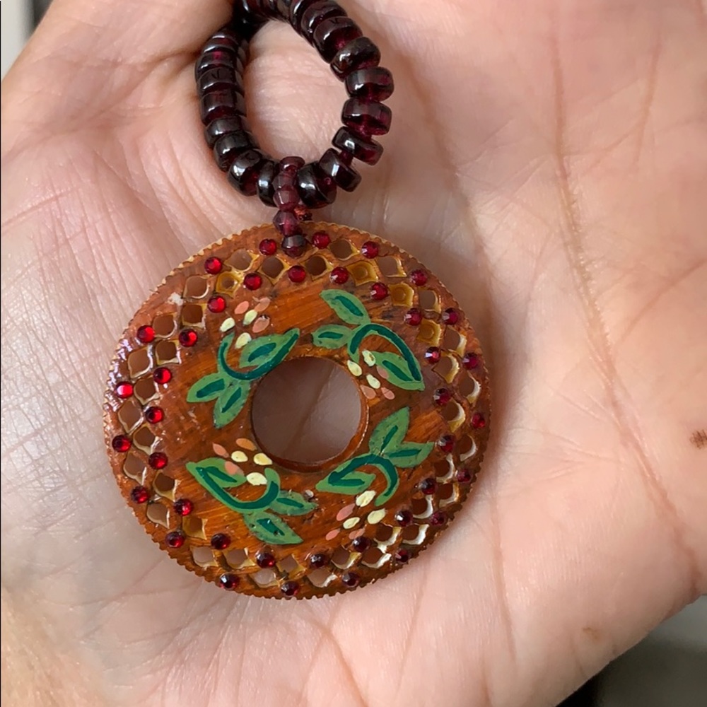 Chan Luu garnet necklace with carved wood pendant